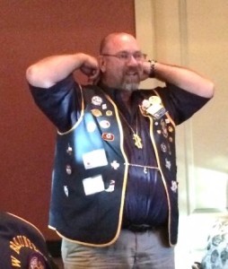 New treasurer, Lion Jeff Kunkel, displays his necklace....