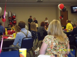 On behalf of the club Grey Baker accepts the Golden Hammer award from the NB Parks and Recreation Dept.