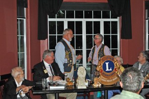 President Grey Baker presents the Past President pin to Immediate Past President Larry Kunkel